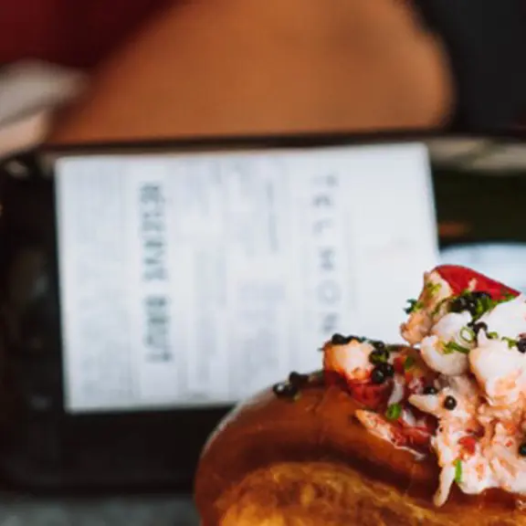 Lobster roll and champagne